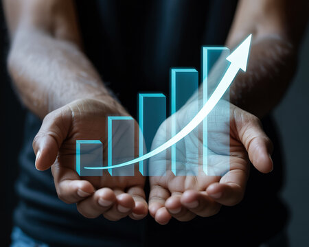 Hands Holding a 3D Bar Graph with Upward Trend Arrow