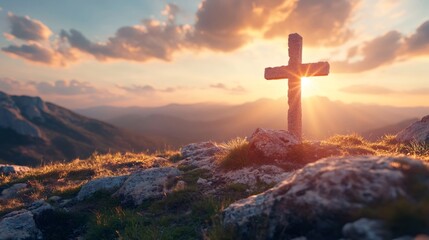 Stone cross on a mountain peak at sunset, with golden sun rays shining through, symbolizing faith, hope, and resurrection for Easter or religious observance.