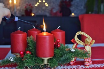 First Advent. The first candle of four is lit.  Tradition before Christmas.