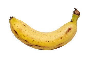 Isolated ripe banana with brown spots and curving shape, fresh fruit ready to eat