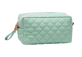 Isolated aqua quilted cosmetic bag stands ready for travel, personal care and toiletry items