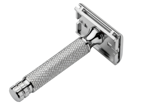 Isolated silver double edge safety razor for shaving and personal grooming close up