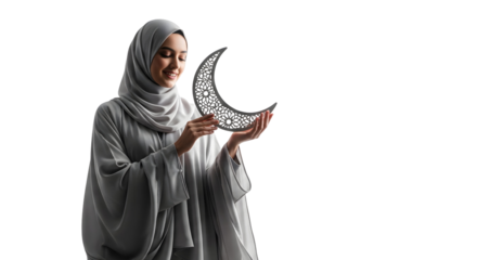 A graceful woman wearing a hijab tenderly holding a crescent moon decoration, isolated on transparent background