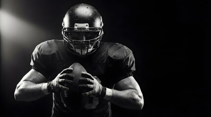 Dramatic Black and White American Football Player Holding Ball Intense Portrait