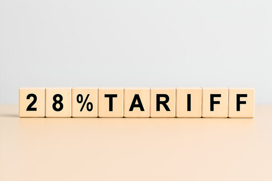 &ldquo;28% Tariff Concept Displayed With Wooden Blocks &ndash; High Tax Rate, Import Duty, Export Fees, Financial Policy, Trade Regulation, Economic Impact, Business Costs and Market Strategy Illustration&rdquo;