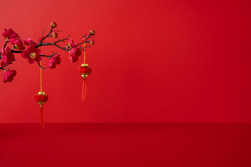 Side view of red Chinese New Year scene with plum blossoms and lanterns, festive mood, greeting...