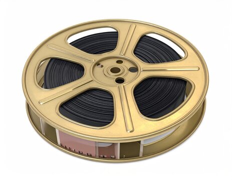 Gold film reel loaded, spooled, retro, isolated, white - Powered by Adobe