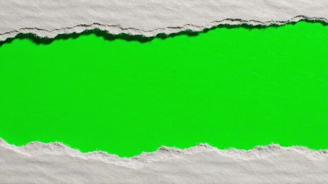 stop-motion horizontal tear revealing bright green screen, two pieces of ripped paper separating slowly, uneven rough edges, natural paper shadows, cinematic transition effect