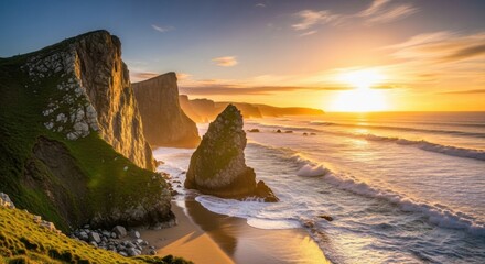 Golden sunset over rugged coastal cliffs and ocean beach