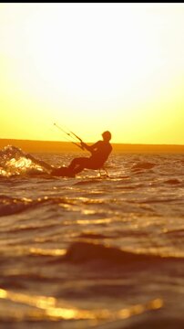 silhouette kitesurfer sunset golden hour extreme water sports travel adventure freedom lifestyle motion