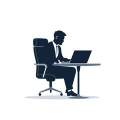 Silhouette of a man working on a laptop at a desk.