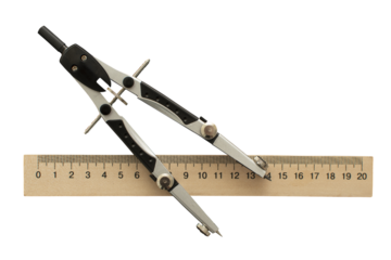 Compass and wooden measuring ruler isolated