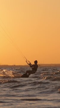 active lifestyle kitesurfer golden hour silhouette motion clip extreme water sport travel adventure