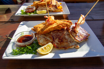 Grilled steak with schnitzel and wedges