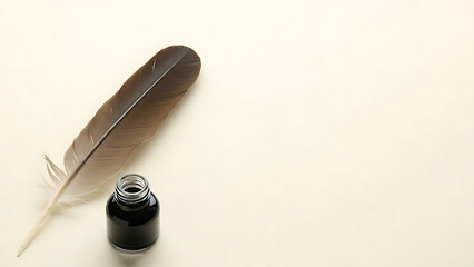 A classic brown feather quill pen lies next to an open inkwell on a blank cream-colored surface.