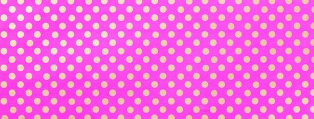 Light purple background from wrapping paper with golden polka dot pattern. Texture of magenta dotted backdrop