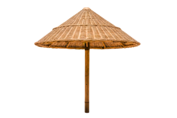 Tropical bamboo beach umbrella parasol with woven straw top isolated on a transparent background
