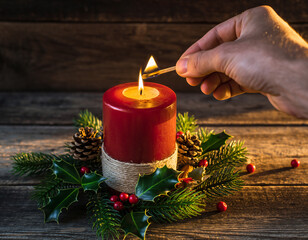 christmas candle being lit and decorations