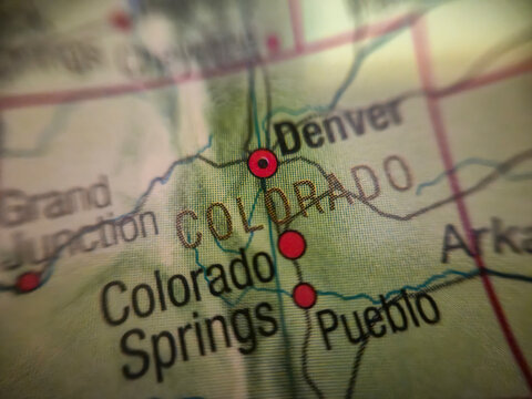 Warsaw, Poland - November 28, 2025: A close-up view of a detailed map highlighting Colorado, showing major cities including Denver and Colorado Springs, with clear labels.