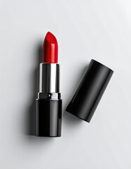 A vibrant red lipstick next to its black cap