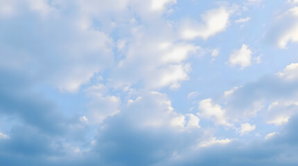 light blue sky with fluffy white clouds background