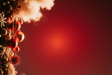 Festive christmas tree decorations on a warm red background