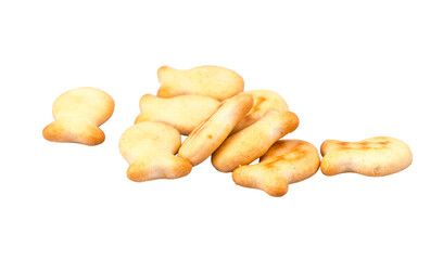 Fish-shaped baked crackers isolated on white background. A pile of small fish-shaped baked crackers isolated on a clean white background.
