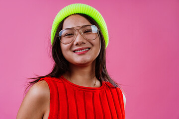 Fototapeta premium Stylish young woman laughing with colorful fashion accessories