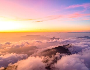 Fototapeta premium Aerial view cloud inversion over hilly terrain during sunset. Golden light, dreamy