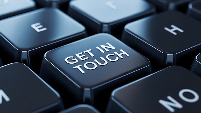 Keyboard key with get in touch message on modern black computer layout
