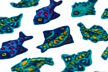 Colorful fish pattern isolated on transparent background with unique designs