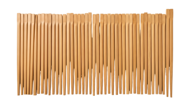 A close-up, overhead view of many vertical, wooden dowels arranged closely together