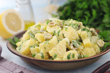 A bowl with Greek potato salads	