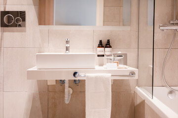 Modern minimalist bathroom with mirror, faucet, basin, and stylish interior clean design.