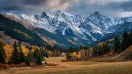 Panoramic autumn mountain landscape with colorful fall foliage, rolling hills, and crisp clear sky creating serene outdoor scenery