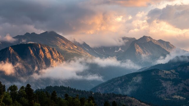 Tranquil sunset over rugged rocky mountains with dramatic clouds, scenic wilderness view, and expansive natural landscape perfect for travel and outdoor adventure