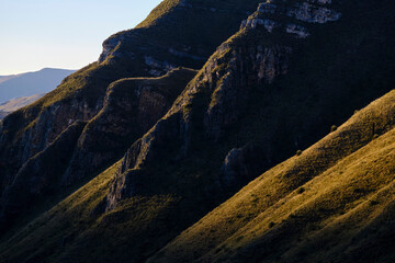Beautiful golden sunset falling over the mountain range in the Peruvian Andes.