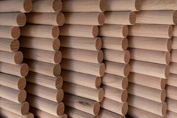 Worked wood cut into tubes with clean wood texture