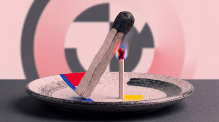 A striking visual of a burning matchstick on a colorful plate against a vibrant background, capturing the dynamic relationship between fire, color, and sensation.