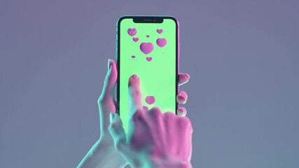Hand tapping on smartphone screen displaying “New Year” text with playful heart emojis in pink neon colors, festive and digital holiday interaction - Powered by Adobe