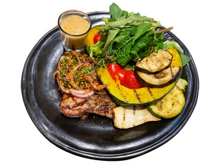 Grilled Thai-style pork steak topped with authentic larb sauce, accompanied by grilled vegetables, fresh salad, and Thousand Island dressing, isolated on transparent background.