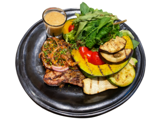 Grilled Thai-style pork steak topped with authentic larb sauce, accompanied by grilled vegetables, fresh salad, and Thousand Island dressing, isolated on transparent background.