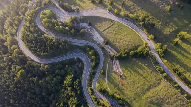 Aerial view of winding roads and green fields, Germany.