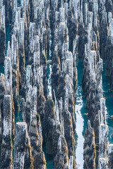 Fototapeta premium aerial view of old pier pilings in coastal maine