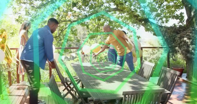Arriving, four friends arranging chairs, tying balloons on deck for events, green spiral overlaying
