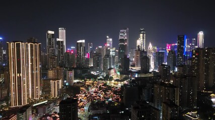 Chongqing Yuchong Peninsula CBD Night Aerial Skyline Footage