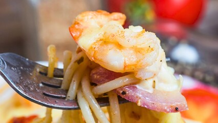 Delicious shrimp and pasta dish with bacon