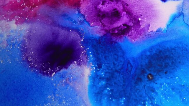 Abstract watercolor painting with flowing blue and purple hues creating a dreamy atmosphere