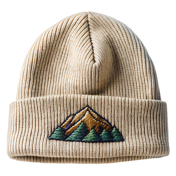 Beige knit beanie with embroidered mountain and tree patch isolated on transparent background