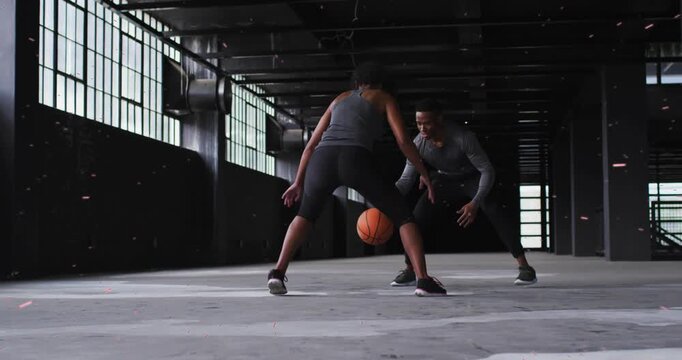 Man starting dribble, woman defending side, ball trail showing crossover for basketball training